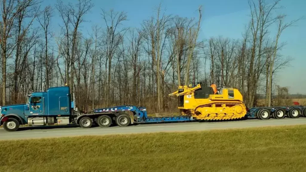 a truck travels along a highway
