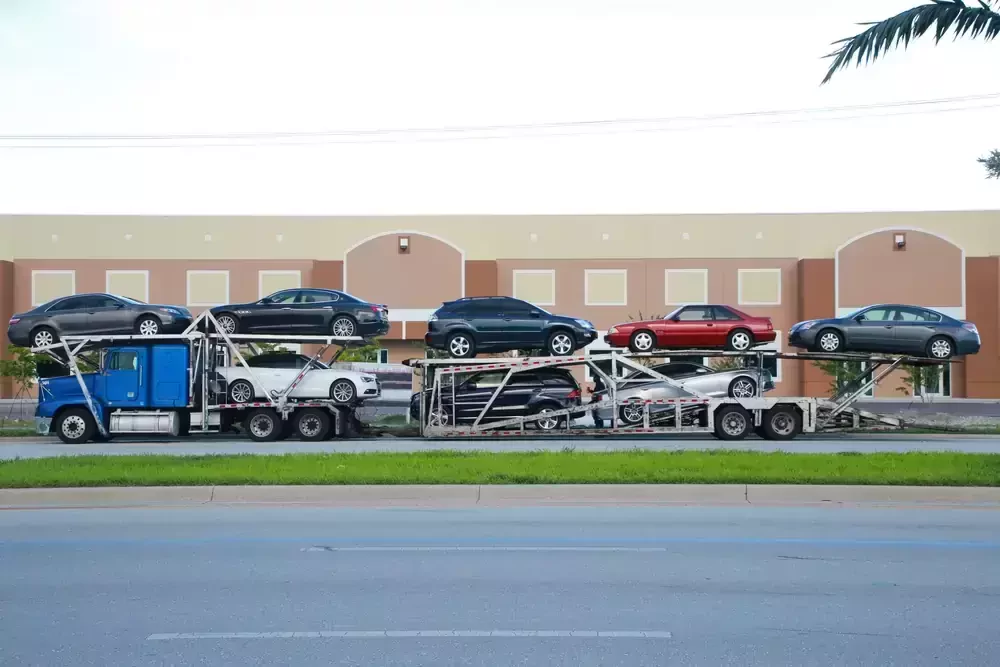 truck loaded with vehicles on a flatbed
