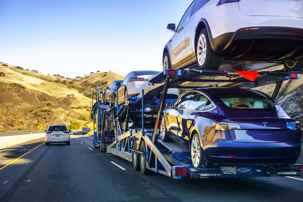 flatbed truck carries a vehicle
