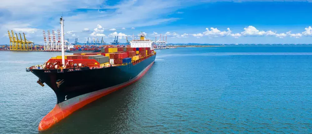 large cargo vessel carrying containers
