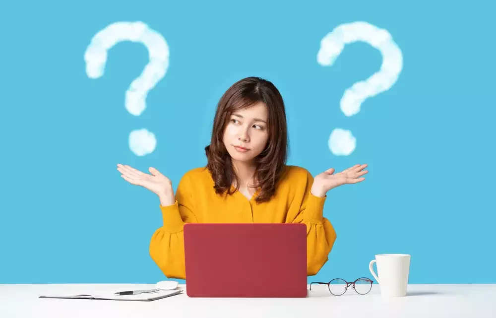 young woman comparing with two things