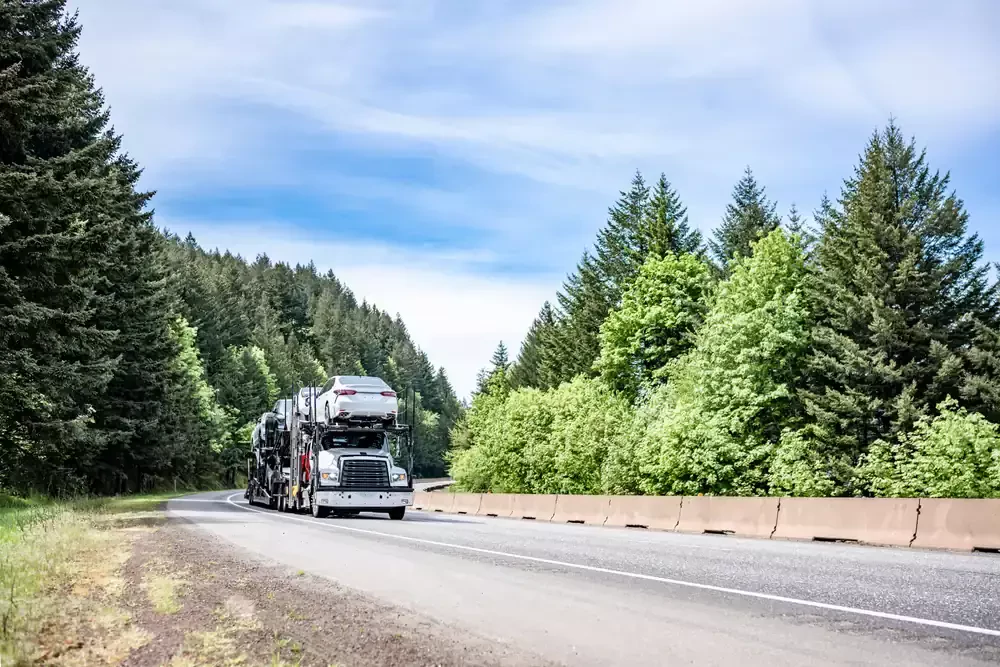 semi truck transporting car