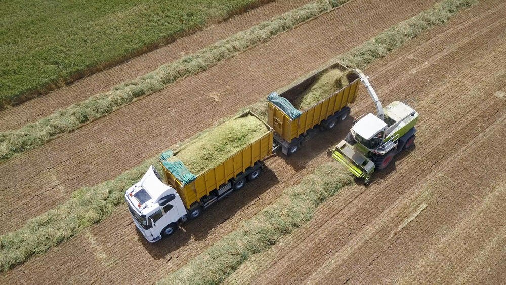 Transporting farm machinery using shipping services