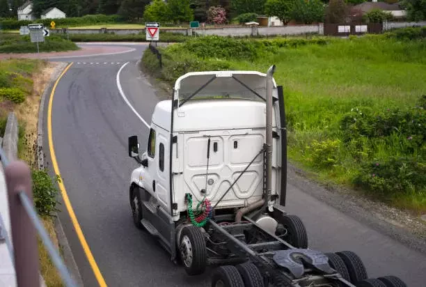 truck driving on roadway