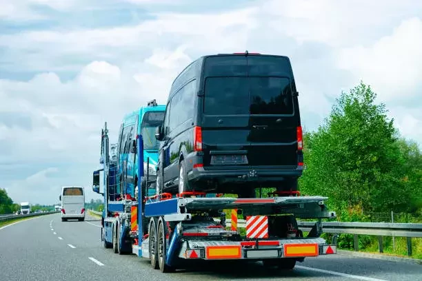 a tow truck engaged in transporting a vehicle