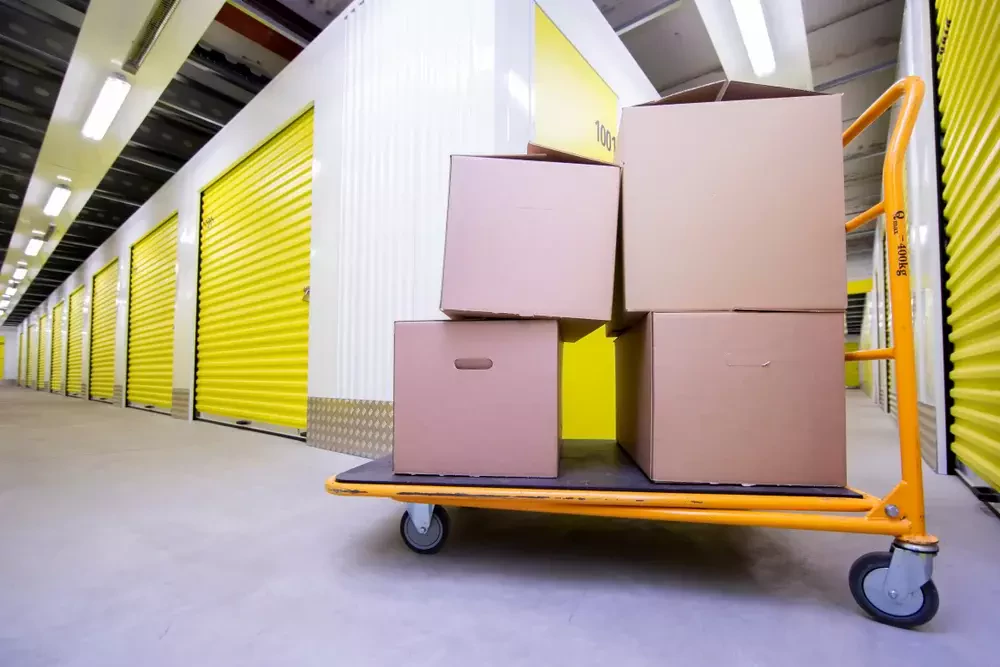 cart loaded with boxes inside a storage