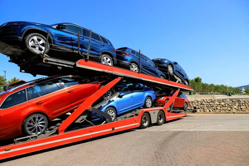 vehicles loaded on a trailer