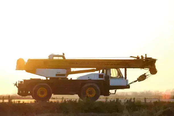 truck transporting a massive crane