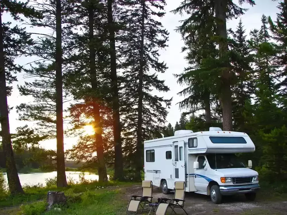 a motorhome parked at sunset time