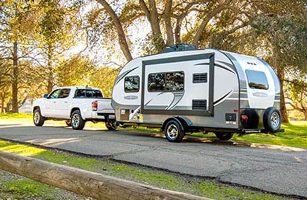 a truck with a travel trailer attached