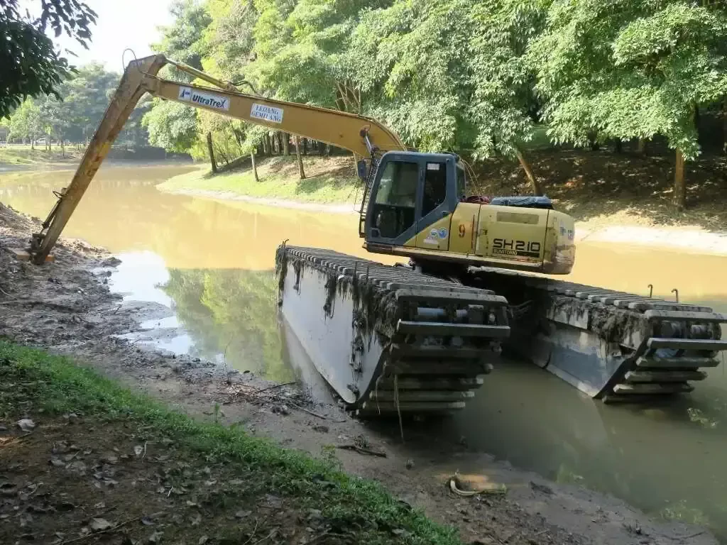 excavator working on a riverside
