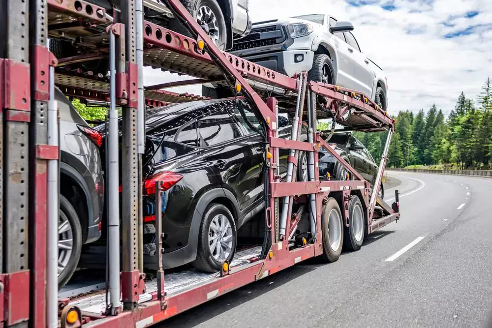truck loaded with vehicles on a flatbed